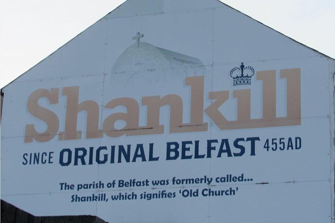 Belfast Murals Taxi Tour - The Peace Wall shows that the past is still present