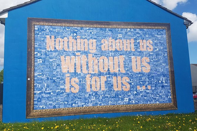 Belfast Troubles Murals Street Art and Peace Wall Walking Tour - Divis Street’s International Mural Wall