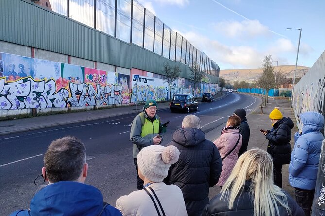 Belfast Troubles Tour: Walls and Bridges - City-center symbols, including the Big Fish and Albert Clock