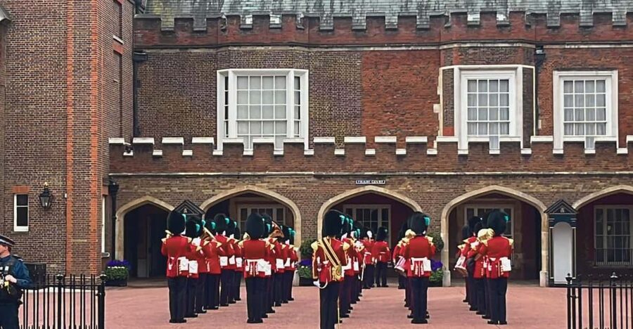 Changing of the Guard at Buckingham Palace - The Mall: following the Guards in motion