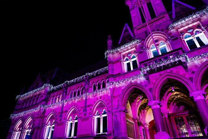 Christmas Mulled Wine Walk of Winchester - A Victorian building lit for the season