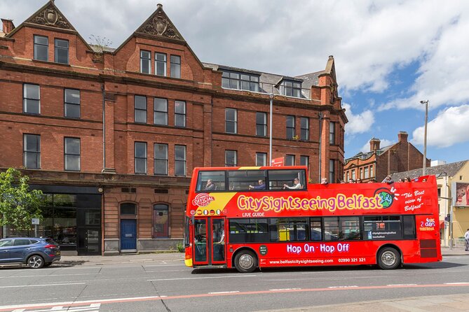 City Sightseeing Belfast Hop-On Hop-Off Bus Tour - Commentary, headphones, and the human touch