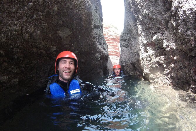 Coasteering Geopark Adventure In Torquay - Jumps, climbing, and the choice to hold back