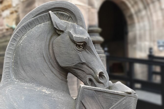 Edinburgh Castle Highlights Tour with Tickets, Map, and Guide - Prison stories and people who lived behind the walls