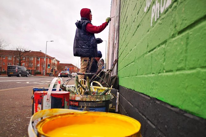 Famous 1.5 hour Belfast Murals Tour - Divis begins the story above Belfast