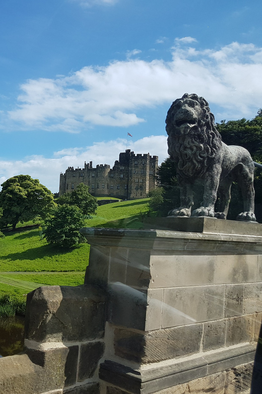 From Edinburgh: Holy Island, Alnwick Castle & Northumbria - Passing Bamburgh on the way to Alnwick