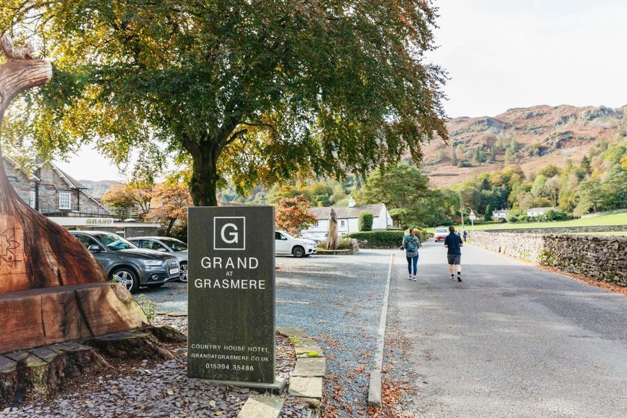 From Manchester: Lake District Bus Tour & Windermere Cruise - Hawkshead and the old village lanes