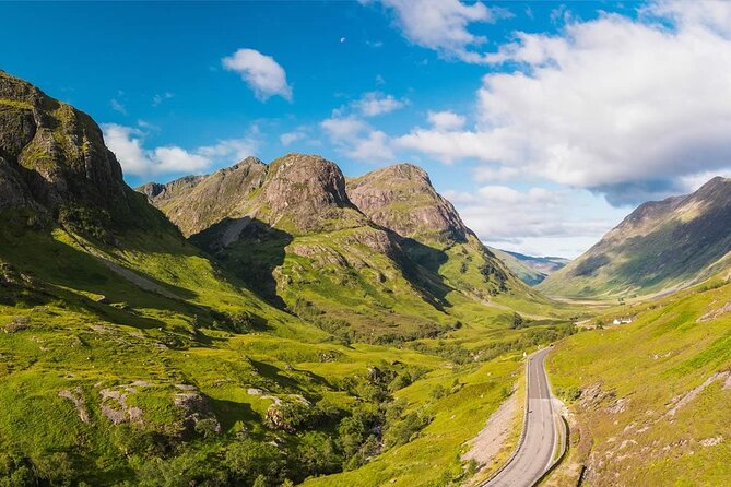 Full-Day Oban Castles and Glencoe Guided Tour from Glasgow - Castle Stalker is a postcard view from the road