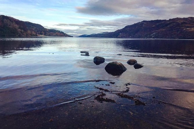 Glasgow: Loch Ness, Glencoe, and the Highlands Day Tour - Glencoe: history, film scenery, and a short photo stop