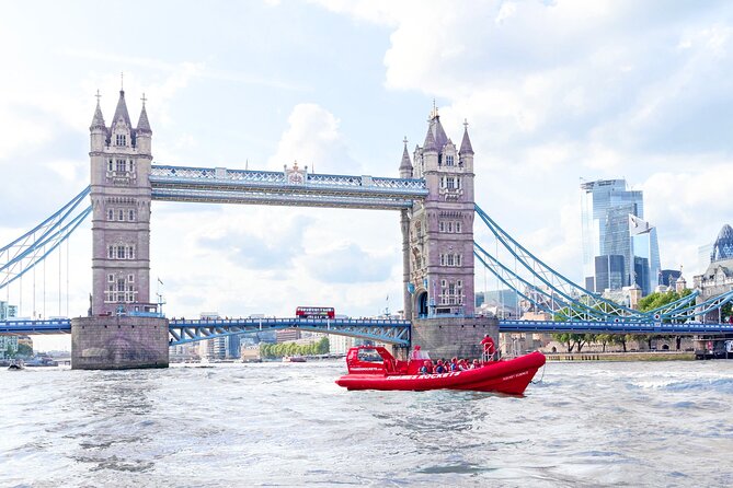 High-Speed Thames River Speedboat in London - HMS Belfast and the Docklands skyline