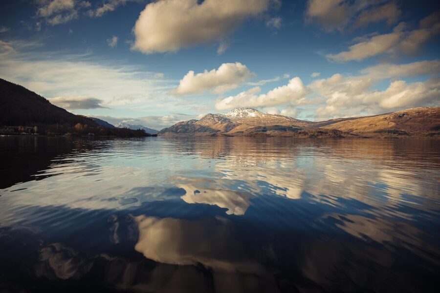 Loch Lomond: Island Discovery 2-Hour Cruise - The first stretch past Loch Lomond Golf Club