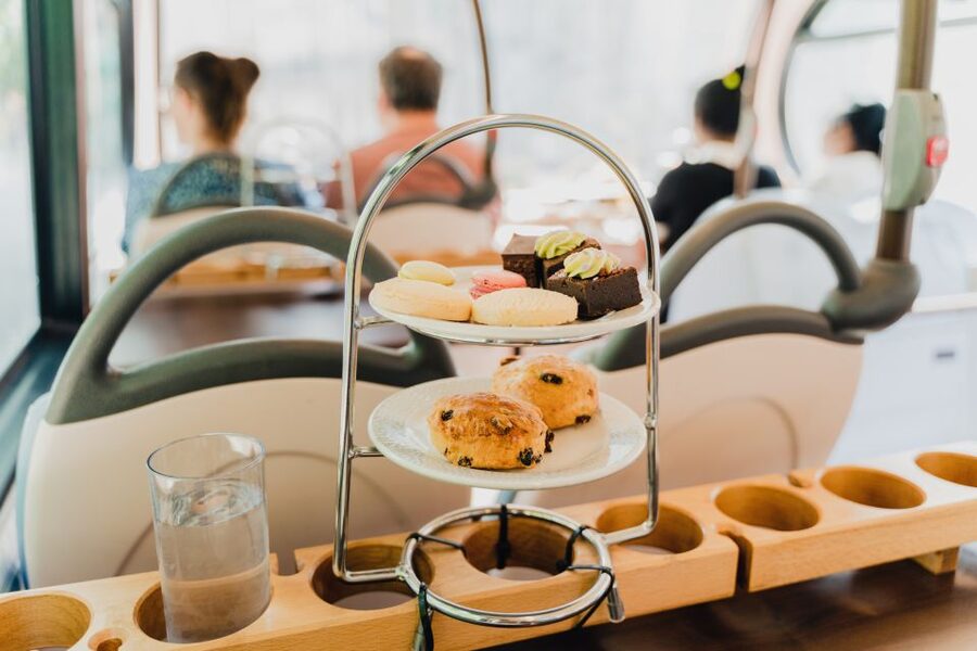 London: Afternoon Tea Bus with a Glass of Prosecco - Finding the pink-striped bus at Golden Tours Stop 1