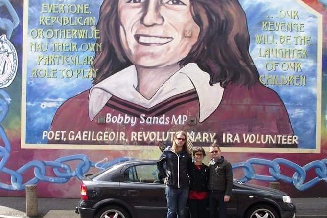 Official World Famous Belfast Taxi Tour ™ - Divis Tower and the Welcome Wall